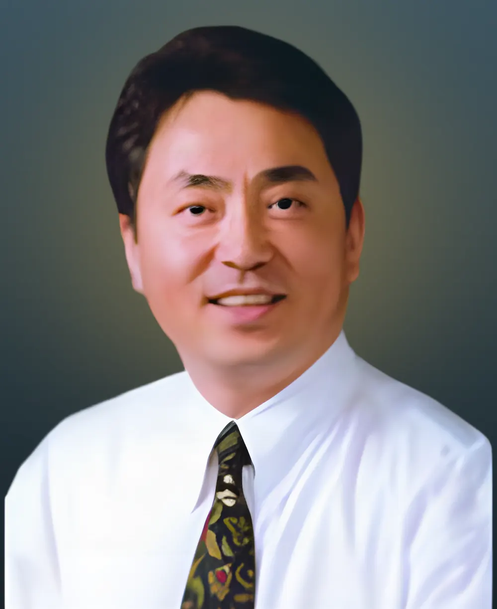 Portrait of Dr. Peter B. Shin in a white shirt and patterned tie